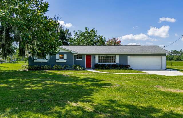 Charming 3/2.5 Home W/ 2 Car Garage on Over 1.5 Acres w/ Chicken Coupe in St. Cloud - 4070 Deer Run Road, Osceola County, FL 34772