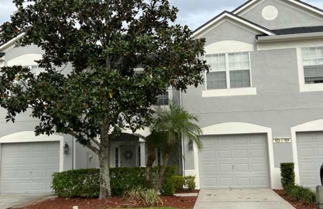 MOVE IN AUGUST! Beautiful 3 bed 2.5 bath townhome with large screened in back porch & 1 car attached garage!! In man gated Spring Isle/Avalon Park!! Gallery 3