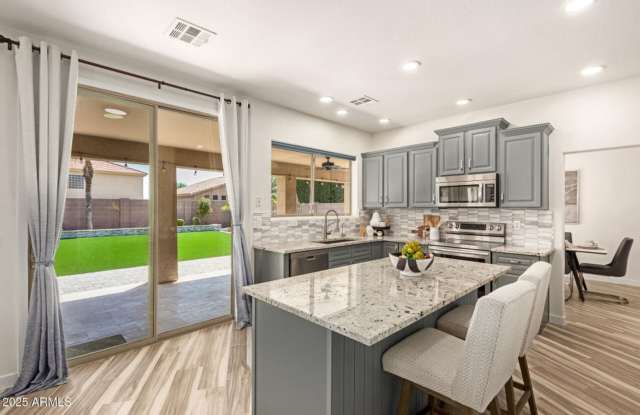 Huge 3 bedroom with A DEN AND LOFT!!! Upgraded Kitchen!!! Large Bedrooms!!! Professionally landscaping which is gorgeous with Faux Grass!!! READY NOW!!! photos photos