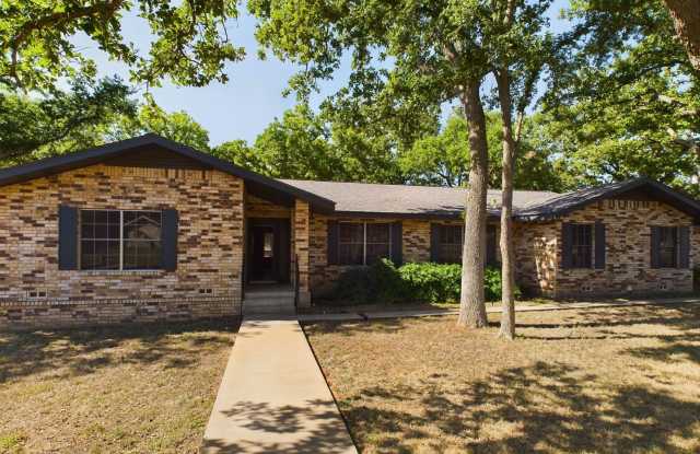 Charming 3-Bed Oasis with Fireplace  Hardwood Floors on Briarwood Circle photos photos