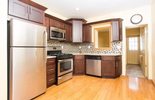 Spacious 3-Bedroom Home with Central Air, In-Unit Laundry and Patio photos photos