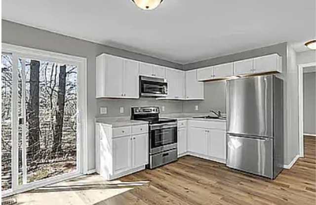 Two bedroom, one bath duplex. Completely remodeled, available August 2025 photos photos