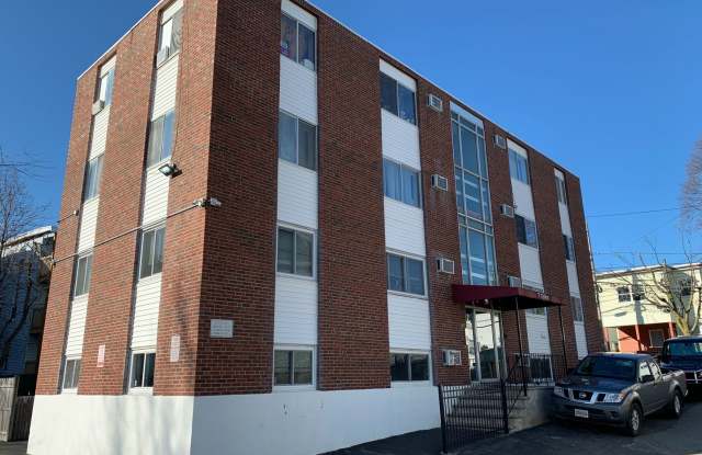 Heat and hot water included! Bright and clean 2 bed 1 bath 1st floor condo in a well managed building photos photos