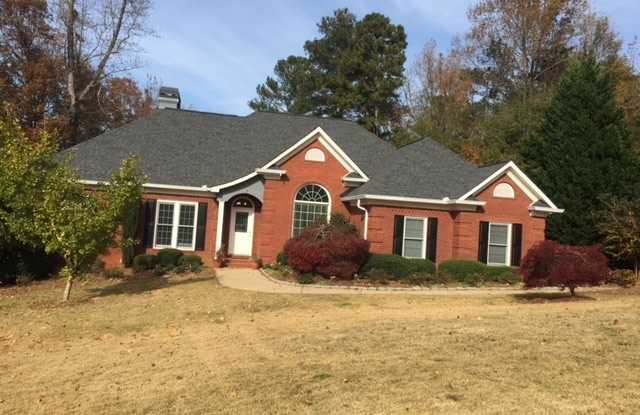 This beautiful brick home is located in Villa Rica and includes 6 bedrooms and 4.5 bath! photos photos