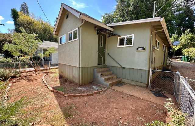 Welcome to this charming 2-bedroom, 1-bathroom home photos photos