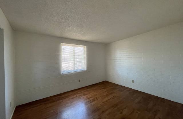 Central 2 bedroom 1 bath unit with Fenced yard. photos photos