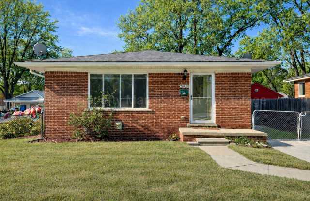 Charming 4-Bedroom Home with Spacious Backyard in Oak Park photos photos