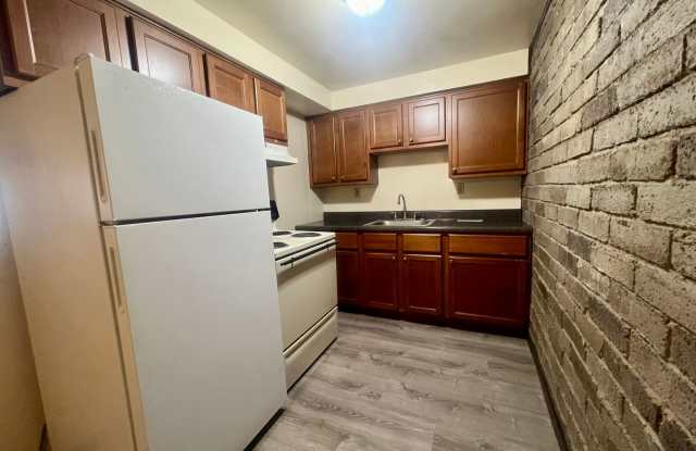 Stunning One Bedroom Apartment! Exposed Brick Throughout! Call Today! photos photos