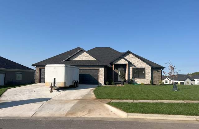 Nearly-new 4-bedroom, 2-bath home in the exclusive Lion's Gate Neighborhood!!! photos photos