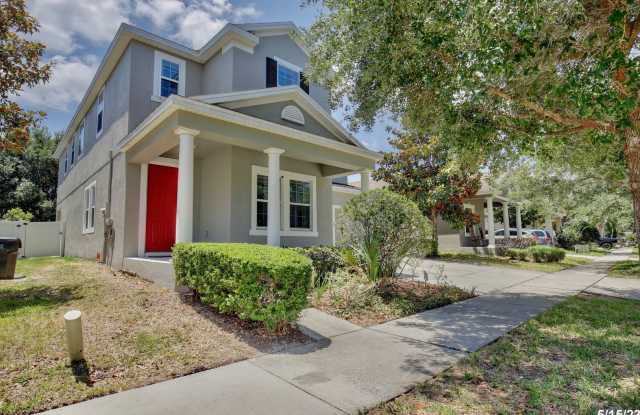 Gorgeous 4/3.5 Home with a Large Fenced Backyard in the Desirable Guard Gated Waters Edge Community at Lake Nona - Orlando! photos photos