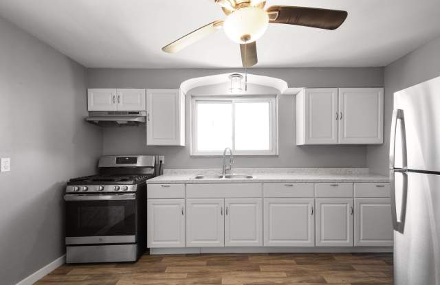SECURE your spot TODAY and ENJOY $100 OFF the 1st 3 MONTHS of rent if signed lease by 10/23/24! LOVELY 4 BED, 3 FULL BATH SINGLE FAMILY HOME AVAILABLE IN CLAIRTON! FRESH OUT OF RENOVATION! FEATURING ATTACHED GARAGE! - 1044 Toman Avenue, Clairton, PA 15025