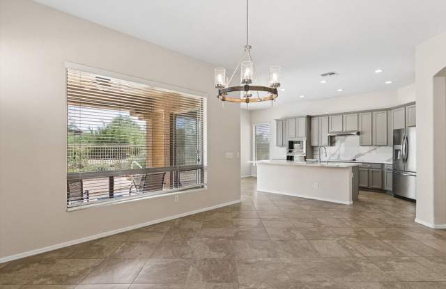Golf course lot in Gated community at Dove Valley Ranch with a Primary bedroom closet you could live in!!! 3 bedroom, 3 bathroom plus room for an office!! Must SEE available NOW!!! Gallery 1