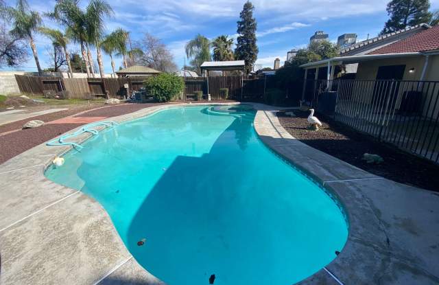 Get ready for Summer in this 3 BD 2 BA SW home with a Pool on a corner lot photos photos