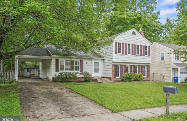 This stunning split-level home boasts 4 bedrooms, 3 baths, and over 1900 sq feet of living space filled with charm. Welcome Home! photos photos