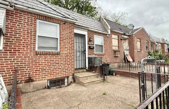 Renovated 2-Bedroom Home with Finished Basement in Bartram Gardens photos photos