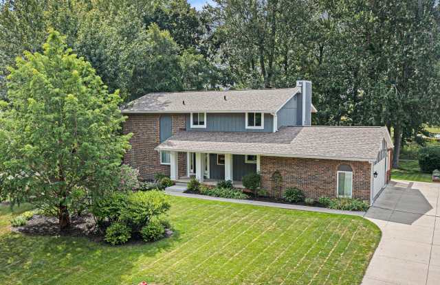 CLASSIC COLONIAL ELEGANCE WITH LAKESIDE SERENITY! photos photos