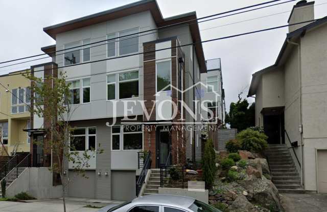 Jevons Property Management Presents 3 Bedroom, 2.5 Bathroom 3-Story Townhouse Across From Adams Elementary School - 2648 Northwest 62nd Street, Seattle, WA 98107
