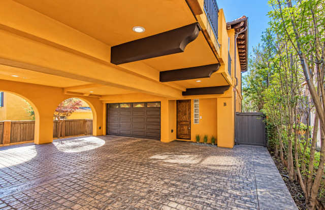 SPACIOUS & SECLUDED, SPANISH MEDITERRANEAN REAR UNIT TOWNHOUSE W/ LARGE ROOFTOP DECK W/ OCEAN/PV VIEWS, 2 BALCONIES, WRAP AROUND YARD & 2-CAR GARAGE ON CUL-DE-SAC STREET CLOSE TO SCHOOLS, SHOPPING, RB PIER & BEACH! Gallery 3