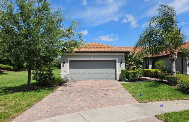 Gorgeous Furnished Annual Rental - 2 Bedroom, 2 Bath, plus Den Located in IslandWalk with its Resort like Community Amenities and Pool! photos photos