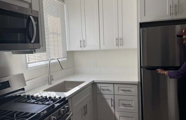 FOR RENT — COMPLETELY REMODELED Apartment photos photos