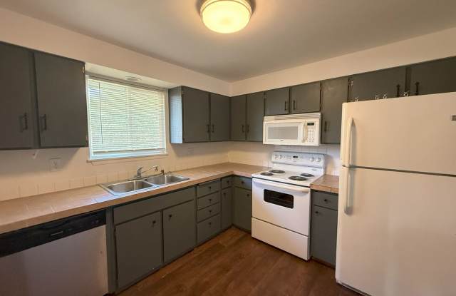Summer Special Price! Charming 4BR Home with Bonus Space  Outdoor Appeal – Pet Friendly! photos photos