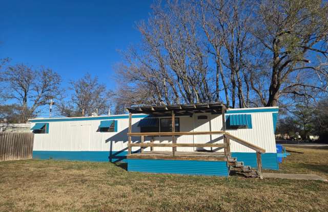 NO PET HOME! Very nice spacious two-bedroom mobile home located in the Cache area! - 313 South 6th Street, Cache, OK 73527