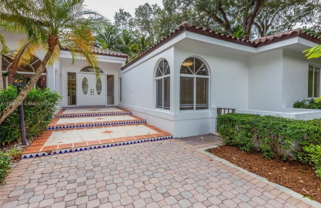 450 Sunset Dr - 450 Sunset Drive, Coral Gables, FL 33143