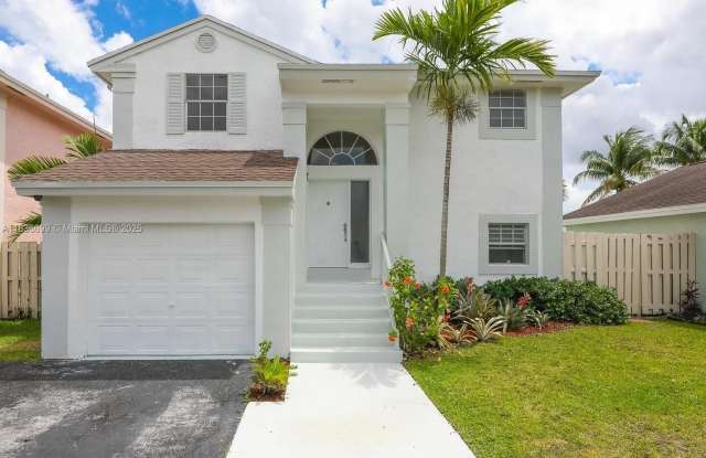 3749 NW 107th Way photos photos