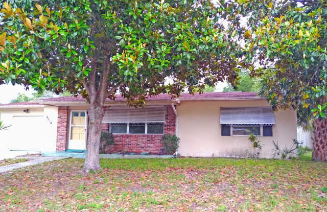 Spacious 2/2 home featuring neutral ceramic tile throughout within the heart of Spring Hill photos photos