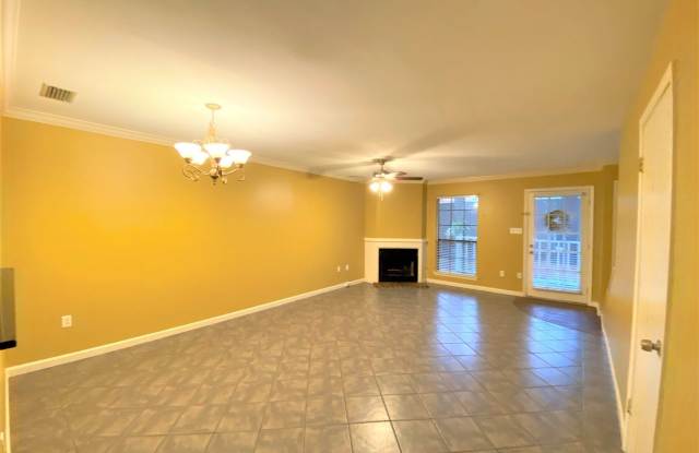 2 Bedroom Townhouse Located near the New Woman's Hospital. Wonderful Quiet Community With Covered Parking and A fenced Patio! Must See! Water, Sewer Garbage Included in the rent ! photos photos