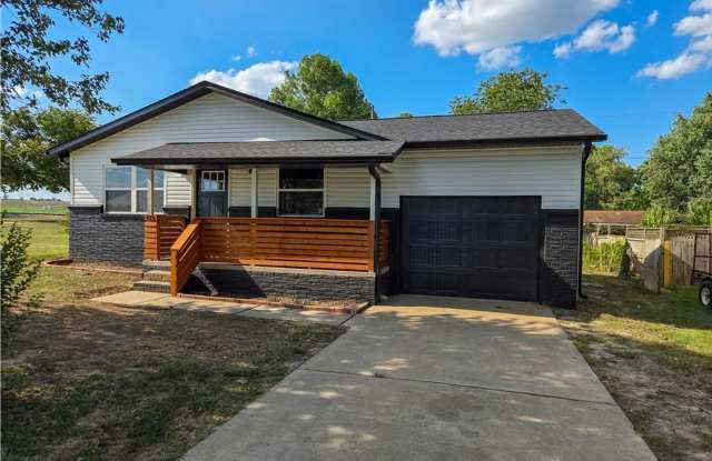 Completely Remodeled 3-Bedroom, 1.5-Bathroom Fayetteville Home with 1x Car Garage and Fully Fenced-in Backyard! photos photos
