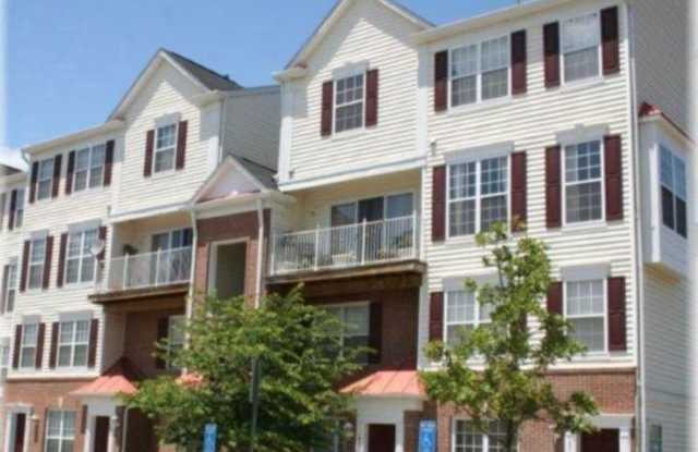 Welcome to this beautifully appointed two level upper condominium that combines modern style with everyday convenience in one of the area's most desirable locations. photos photos