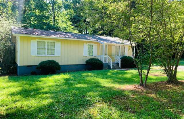 Private and wooded location, hardwood floors, eat-in kitchen, must see! photos photos