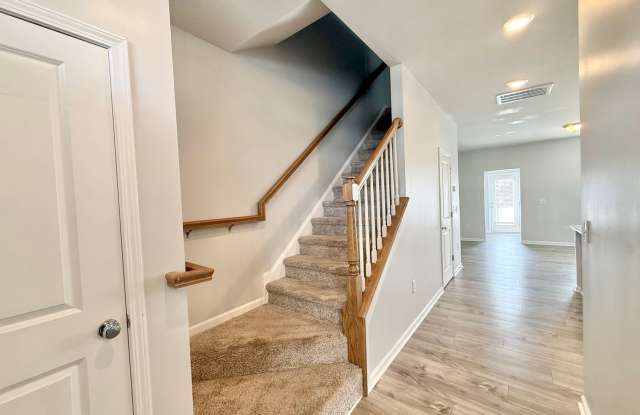 **OFFERING REFUNDABLE APPLICATION FEES & $100 MOVE IN PROMOTION** Modern 3BD, 2.5BA Clayton Townhome Near Highways with Easy Access to Downtown Clayton and Garner Gallery 3