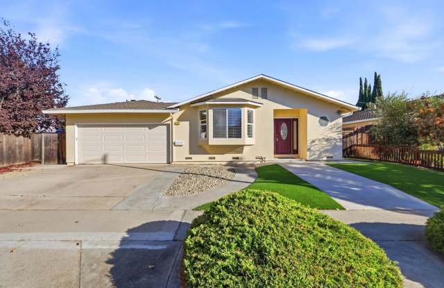 Available Now! Bright Single-Story Ranch with Updated Kitchen and Skylit Family Room Gallery 1