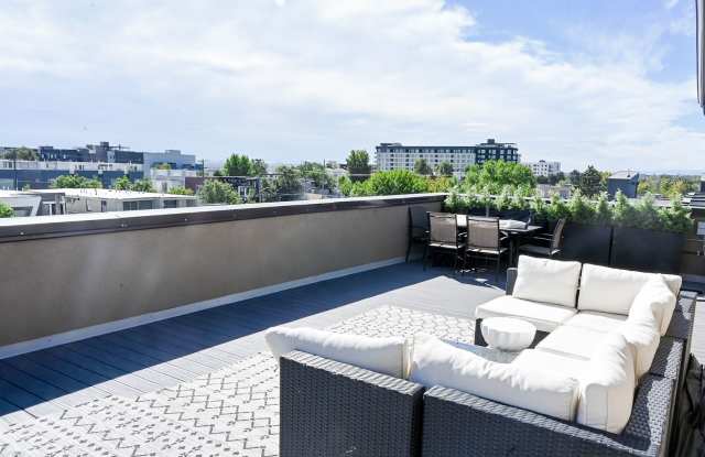 Incredible 3 Story Townhome with Large rooftop Deck Gallery 1