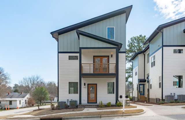 **OFFERING RENT PROMOTION FOR FIRST 6 MONTHS, WAIVED APPLICATION FEES  $300 MOVE IN PROMOTION** Luxurious New Construction 3BD, 4BA Downtown Raleigh Townhome with Spacious Balcony and Natural Light Throughout photos photos