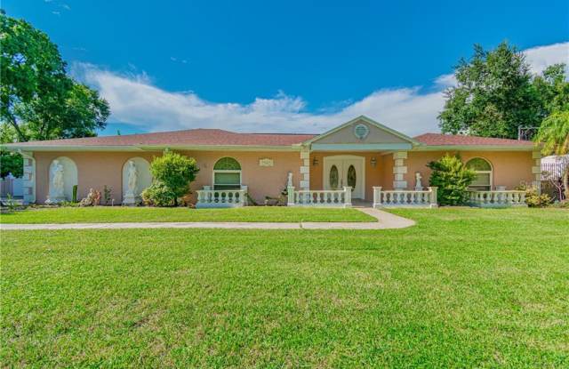 7607 BARRY ROAD - 7607 Barry Road, Town 'n' Country, FL 33615