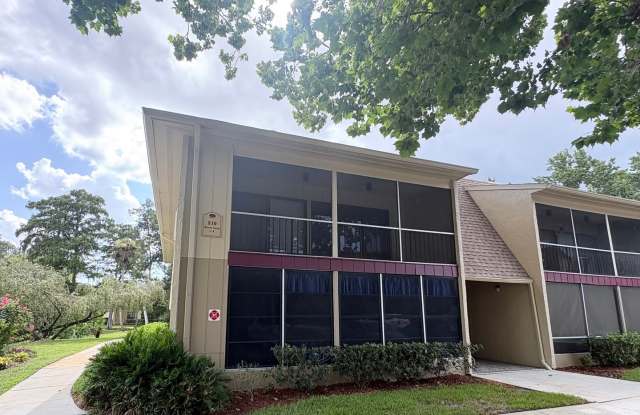 Nicely Updated 1/1 Condo in Winter Springs ~ Wood Plank Tile Floors and Large Screened Patio! photos photos
