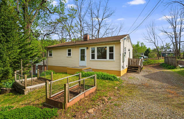 Sunny 2-Bedroom Home with Fenced-In Yard and Basement photos photos