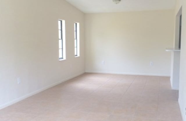 SPACIOUS 2BR/1BA Duplex, Vaulted Ceilings, More! NO APPLICATION FEE! - 4033 Saint Paul Drive, Jan Phyl Village, FL 33880