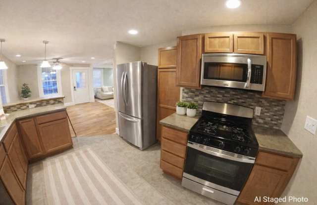 Huge Fenced-in Yard + Washer  Dryer Included + Beautiful Hardwood Floors! Available May 2nd! photos photos