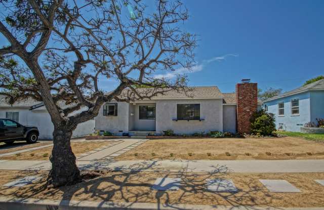 BEAUTIFULLY REMODELED, BRIGHT  AIRY LIBERTY VILLAGE HOME W/ LARGE REAR FENCED YARD W/ PATIO  DETACHED OVERSIZED 2-CAR GARAGE NEXT TO SCHOOLS, PARKS  5 MINS TO BEACH! - 1909 Lynngrove Drive, Manhattan Beach, CA 90266