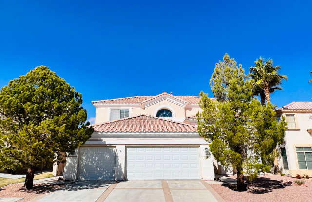 STUNNING 2 STORY 4BED 2.5BATHS LOCATED IN GUARD GATED RHODES RANCH. HARDWOOD FLOORS AND TILE THROUGHOUT THE FIRST LEVEL AND CARPET ON THE SECOND. STAINLESS STEEL APPLIANCES AND GRANIATE COUNTER TOPS. - 50 Castle Creek Court, Spring Valley, NV 89148
