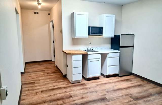 UNDER NEW MANAGEMENT: Accessible Studio w/ Laminate Floors! All-Inclusive "One Bill" Living, Free Wi-Fi & Laundry! photos photos