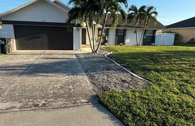 609 SE 2nd TR - 609 Southeast 2nd Street, Cape Coral, FL 33990