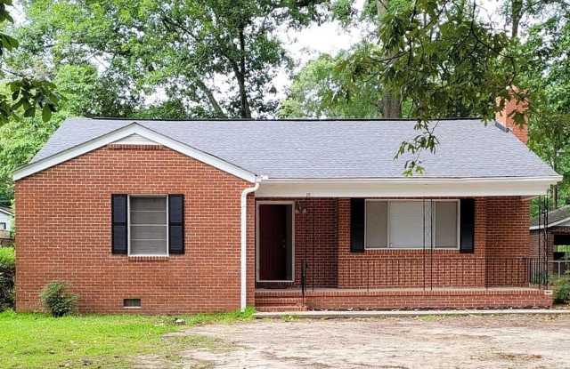 Charming All-Brick Home with Original Hardwood Floors & Fenced Yard! Gallery 1