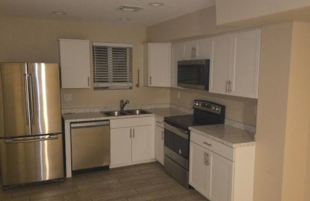Completely Remodeled top to Bottom down the street from Glendale Community College!!! AVAILABLE NOW!!! Upgraded kitchen appliances, full size washer and dryer in unit!!! photos photos