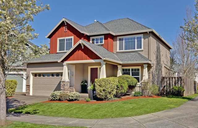 Beautiful Cedar Mill Craftsman on a Corner Lot with 4 Bedrooms + Den, Large Backyard, Solar & EV Charger Gallery 1