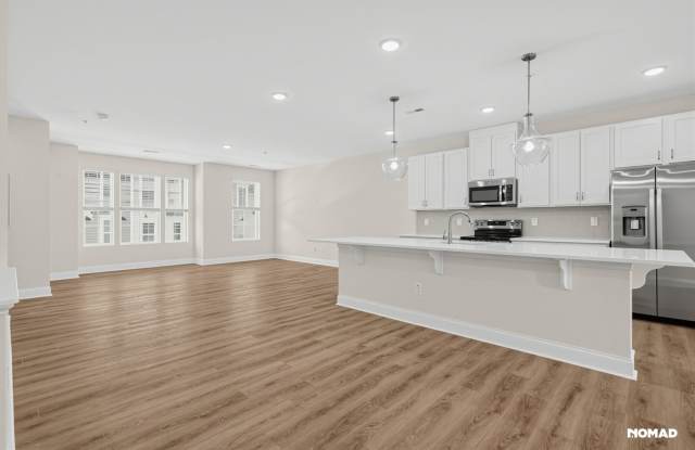 Brand-new 2026 construction Condo | 2,428 sq. ft. | 3 bedrooms | 2.5 baths | 1-car garage | Walk to Wegmans Gallery 1